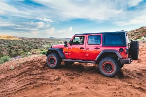 red jeep on cliff